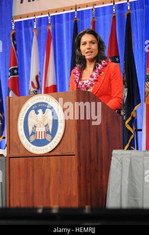 Congresswoman and Hawaii National Guard officer Tulsi Gabbard speaks at the 135th Annual National Guard Association of the United States conference in Honolulu, Sept. 20-23, 2013. The NGAUS conference takes place at a different location every year discussing topics that greatly affect or impact the National Guard now and in the future. Hawaii National Guard hosts 135th National Guard Association of the United States conference 130923-A-VC646-149 Stock Photo