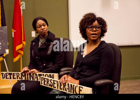 The 81st Regional Support Command held their annual Black History Month celebration at Fort Jackson, S.C., on Feb. 27. Pictured here left to right, are Master Sgt. Tomeka Brown as Rosa Parks and Ms. Mary Nelms as Claudette Colvin. The historical figures were women who refused to abide by the laws about segregated buses. Black History Month at 81st Regional Support Command 140227-A-IL912-043 Stock Photo