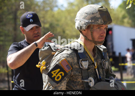 Army Rangers undergo parachute inspection by a Jump Master at Camp ...