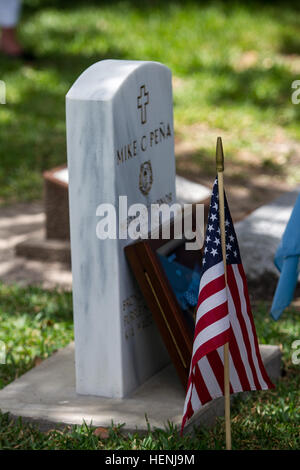The Medal of Honor for Master Sgt. Mike C. Peña, 5th Cavalry Regiment, 1st Cavalry Division, was temporarily on display during a ceremony at Peña's resting place June 8, 2014 at Cedarvale Cemetery in Bay City, Texas. A Medal of Honor memorial headstone in Peña's honor was unveiled during the ceremony. Peña was one of 24 Soldiers from World War II and the Korean and Vietnam Wars to have their Distinguished Service Cross upgraded to the Medal of Honor in a March 18, 2014 ceremony at the White House.  (U.S. Army photo by Sgt. 1st Class Jeremy D. Crisp, 1st Cavalry Division Public Affairs/released Stock Photo