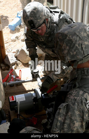 Soldiers from the 244th Engineer Battalion and 338th Engineer Company ...