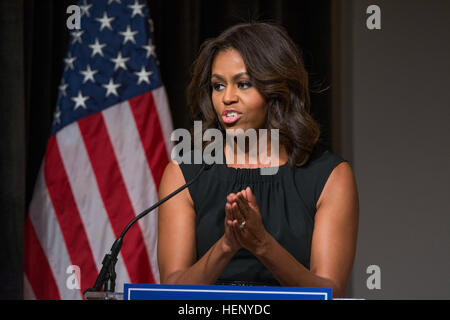 First Lady Michelle Obama gives keynote remarks at the Women Veterans Career Development Forum Nov. 10, 2014, at the Women in Military Service for America Memorial in Arlington, Va. (Joint Base Myer-Henderson Hall PAO photo by Damien Salas) First Lady, hiring women vets makes %%%%%%%%E2%%%%%%%%80%%%%%%%%98good business sense%%%%%%%%E2%%%%%%%%80%%%%%%%%99 141110-A-CD772-002 Stock Photo