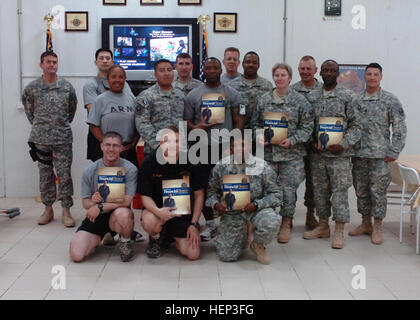 Several Soldiers with the Special Troops Battalion, 1st Sustainment Brigade, meet each week in the Shadley Room of Dinning Facility Two on Camp Taji to attend the Dave Ramsey Financial Peace University DVD class. 'I like that the course is not centered on the fake notion of how to get rich or become a millionaire. Instead it focuses on the basic principles of money management,' stated Maj. Thomas Buchholz, a Pensacola, Fla., native, and the financial management support operations officer, for the STB. 'I enjoy the dialogue and sharing of tips as a group.' Soldiers Seek Financial Freedom 102936 Stock Photo