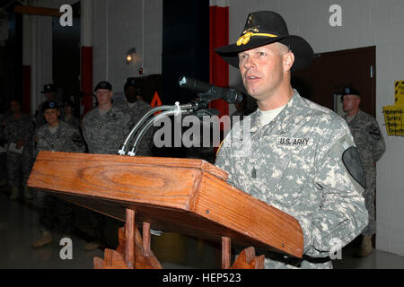 Sutter Creek, Calif., native Command Sgt. Maj. Scott Spiva, outgoing command sergeant major of the 1st Air Cavalry 'Warrior' Brigade, 1st Cavalry Division, speaks during a change of responsibility ceremony at Gray Army Air Field, Fort Hood, Texas, June 26. 'I expect to see and hear great things about the Air Cav. during the upcoming months and during your upcoming deployment to Iraq,' said Spiva in his remarks to those in attendance. Spiva is headed to Fort Lewis, Wash., for his next assignment. Warriors welcome new CSM, say goodbye to old friend 98612 Stock Photo