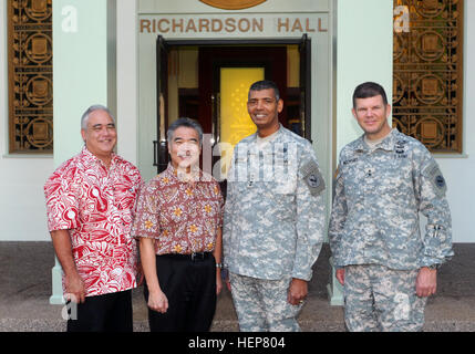 (From left to right)  Mr. Mike McCartney, State of Hawaii Chief of Staff, Hawaii Governor, Gov. David Y. Ige, U.S. Army Pacific commander Gen. Vincent K. Brooks and U.S. Army Pacific Chief of Staff, Maj. Gen. Todd B. McCaffrey, pose for a picture in front of the U. S. Army Pacific headquarters, Richardson Hall, March 23 on historic Palm Circle, Fort Shafter, Hawaii.  Gov. Ige received a briefing on Army operations in Hawaii and throughout the Pacific as well as a helicopter tour of the Army training areas on Oahu. Hawaii governor visits Fort Shafter 150323-A-TR316-001 Stock Photo