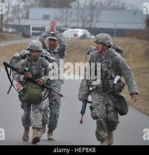 A Soldier completes part of a 12-mile ruck march during Warrior Week at ...