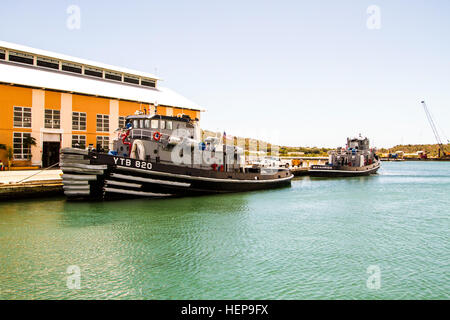U.S. Navy YTB 831, the Dekanawida, moored at pier Tango, waits for her