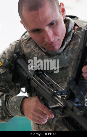 A Soldier from the 412th Theater Engineer Command completes a four-mile ...