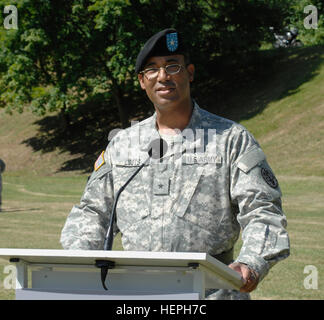 Brig. Gen. Norvell V. Coots, Regional Health Command Europe (RHCE) commanding general, speaks with the crowd during the change of responsibility and command activation ceremony at Sembach Kaserne, Germany, July 10, 2015. (U.S. Army photo by Visual Information Specialist  Elisabeth Paque/Released) RHCE activation ceremony 150710-A-PB921-201