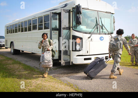 Soldiers of the 155th Headquarters Headquarters Company travel back home to Tupelo, Miss., on CH 47 Chinooks July 12, 2015. (Mississippi National Guard photo by 1st Lt. Jennifer Frazer, 155th Armored Brigade Combat Team) Air flight to home station 150711-A-DE841-9237 Stock Photo