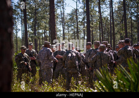 U.S. Army Reserve Soldiers, representing 32 states, receive a briefing on land navigation during this year's 200th Military Police Command's Best Warrior Competition held at Camp Blanding, Fla., Feb. 9. The winning noncommissioned officer and junior enlisted Soldiers will move on the U.S. Army Reserve Command competition in May. (U.S. Army Photo by Sgt. Audrey Ann Hayes) Compass and competition 160209-A-KE966-649 Stock Photo