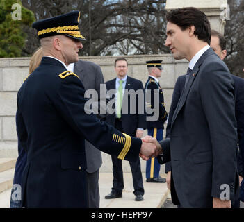 Maj. Gen. Bradley A. Becker, U.S. Army Military District of Washington commanding general, escorts Justin Trudeau, Prime Minister of Canada, during an Armed Forces Full Honors Wreath-Laying Ceremony at the Tomb of the Unknown Soldier at Arlington National Cemetery, Va., March 11, 2016. Canadian prime minister honors America%%%%%%%%E2%%%%%%%%80%%%%%%%%99s heroes 160311-A-JO147-002 Stock Photo