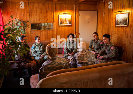 U.S. Army Brig. Gen. Giselle Wilz, NATO Headquarters Sarajevo commander, speaks with female officers of the Turkish Land Forces during a mentoring session at Camp Butmir, Bosnia and Herzegovina, April 7, 2016. Wilz discussed cultural differences, women in the military and gave advice on how to be an effective leader. Wilz plans on hosting more mentoring sessions with militaries of other nations. (U.S. Air Force photo by Staff Sgt. Clayton Lenhardt/Released) 2509286 Female officers of the Turkish Land Forces at Camp Butmir, Bosnia and Herzegovina 2016 Stock Photo