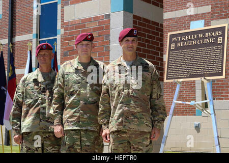 Maj. Gen. Richard Clarke, commander of the 82nd Aiborne Division, Col. Gregory Beaudoin and Command Sgt. Maj. Kenneth Johnson, command team for 3rd Brigade Combat Team, 82nd Abn. Div., gather during a dedication ceremony during All American Week 2016 at Fort Bragg, N.C., May 24, 2016. All American Week is an opportunity for 82nd Airborne Paratroopers, past and present, and their Families to come together, enjoy camaraderie and celebrate being members of the All American Division. This year's All American Week theme is 'Tomorrow's Force, Today!' (U.S. Army photo by Sgt. Anthony Hewitt/Released) Stock Photo