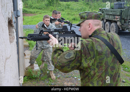 Members of the PA National Guard's 2-112th Infantry Battalion, 56th Stryker Brigade, 28th Infantry Division, train with Lithuanian soldiers in June 2006 as part of the National Guard's State Partnership Program. Pennsylvania National Guard members concurrently trained in Lithuania and Estonia as part of multinational exercises there. PA National Guard's 2-112th Infantry Trains with Lithuanian Counterparts (Image 1 of 7) 160603-A-TN333-441 Stock Photo