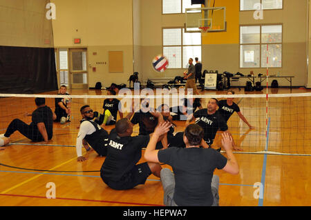 Soldiers from the Team Army sitting volleyball team practice during training for the 2016 Department of Defense Warrior Games being held at the United States Military Academy at West Point, N.Y., June 9, 2016. The DoD Warrior Games, June 15-21, is an adaptive sports competition for wounded, ill and injured service members and Veterans. Athletes representing teams from the Army, Marine Corps, Navy, Air Force, Special Operations Command and the United Kingdom Armed Forces compete in archery, cycling, track, field, shooting, sitting volleyball, swimming, and wheelchair basketball. (US Army photo  Stock Photo