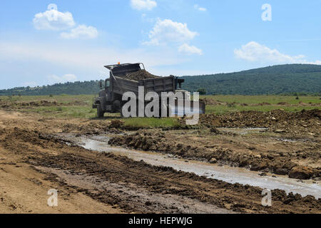 Heavy construction equipment operated by military engineers from the Tennessee and Mississippi Army National Guard extend a tank firing range at Novo Selo Training Area, Bulgaria during Operation Resolute Castle on June 25, 2015.  Maj. Gen. Max Haston, The Adjutant General for the State of Tennessee came to Novo Selo Training Area to review the progress of the 194th Engineer Brigade on June 28, 2016.  (U.S. Army photo by 1st Lt. Matthew Gilbert, 194th Engineer Brigade, Tennessee Army National Guard) The Adjutant General, Tennessee National Guard, Visits Deployed Soldiers in Bulgaria 160612-A-C Stock Photo