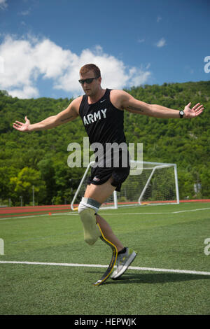 A U.S. Army veteran trains for track and field events in preparation for the 2016 Department of Defense Warrior Games at the United States Military Academy, West Point, New York, on June 12, 2016. The games provide adaptive sports competitions for wounded, ill, and injured service members and veterans from multiple military branches. Stock Photo