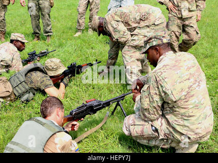 YAVORIV, Ukraine - Soldiers of 6th Squadron, 8th Cavalry Regiment, 2nd  Infantry Brigade Combat Team, 3rd Infantry Division train Ukrainian Soldiers on  trigger squeeze, July 27, 2016. Trigger squeeze is one of the fundamentals of rifle  marksmanship. Soldiers of 6-8 Cav are here in support of the Joint Multinational  Training Group-Ukraine. JMTG-U is responsible for training Ukrainian land forces  and building a team of Ukrainian cadre who will ultimately assume that  responsibility. The training is designed to reinforce defensive skills of the  Ukrainian Ground Forces in order to increase th