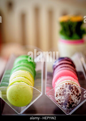 Multi-colored Macaroon selection on cake stand Stock Photo