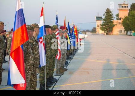 Soldiers from 10 ally and partner nations in formation during the opening ceremony of exercise Immediate Response 16. Immediate Response 16 is a multinational, brigade-level command post exercise utilizing computer-assisted simulations and field training exercises spanning two countries, Croatia and Slovenia. The exercises and simulations are built upon a decisive action based scenario and are designed to enhance regional stability, strengthen Allied and partner nation capacity, and improve interoperability among partner nations. The exercise will occur Sept. 9-23, 2016, and will include more  Stock Photo