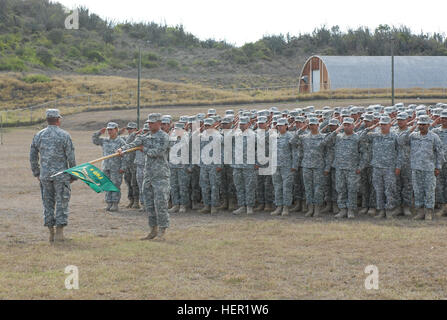 GUANTANAMO BAY, Cuba – Soldiers from the 480th Military Police Company of the Puerto Rico Army National Guard stand in formation during a transfer of authority ceremony at Joint Task Force Guantanamo, Nov. 12, 2009. The 115th Military Police Company of the Rhode Island Army National Guard will take over for the 480th after a year-long deployment to U.S. Naval Station Guantanamo Bay in support of Joint Task Force Guantanamo. JTF Guantanamo conducts safe, humane, legal and transparent care and custody of detainees, including those convicted by military commission and those ordered released by a  Stock Photo