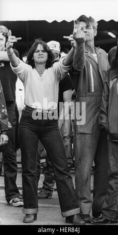 Ku Klux Klan members and supporters jeer and taunt African American civil rights marchers in Monroe, Georgia. Stock Photo