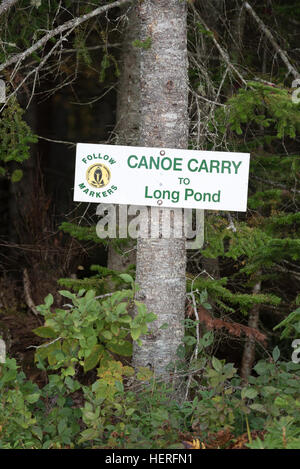 Canoe carry sign in the St. Regis Canoe Area of Adirondack State Park, New York. Stock Photo