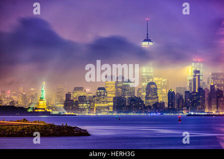 New York City skyline on a foggy night. Stock Photo