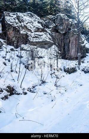 Mazacke skaly sandstone rock formation bellow Lysa hora hill in winter Moravskoslezske Beskydy mountains with snow Stock Photo