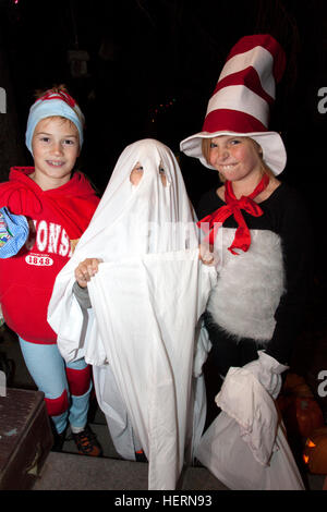 Dr. Seuss Cat in the Hat, Ghost and Thing 1 Halloween characters out for a night of trick and treat. St Paul Minnesota MN USA Stock Photo