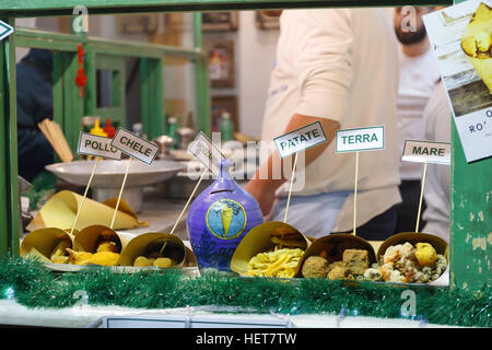 Naples, Italy - December 9, 2016: Deep-fried food bowls ready to be sold in the street. We are in front of a typical Neapolitan fry. Stock Photo