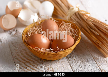 Organic chicken eggs in basket Stock Photo