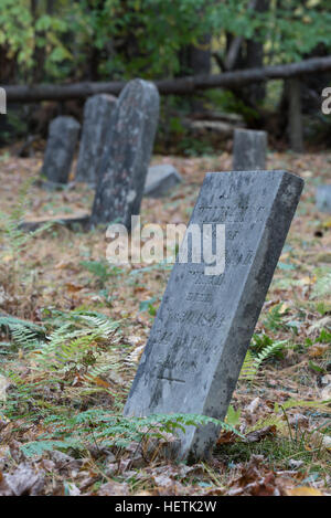 Old headstones marking graves in the Wardsboro Cemetery in New York's Adirondack Mountains. Stock Photo