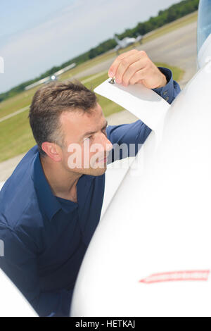 checking the fuel Stock Photo