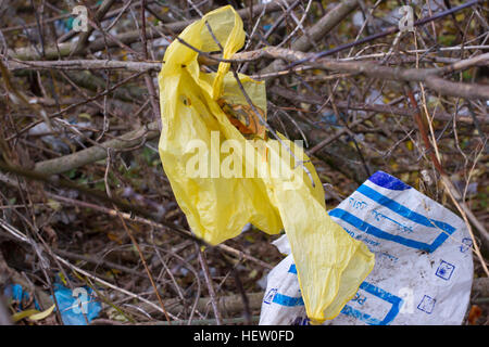 Pile of plastic bags and other refined petroleum products dumped in landfill. Garbage heap gives infiltrate into ground. Waste sorting is required. Lviv city Stock Photo