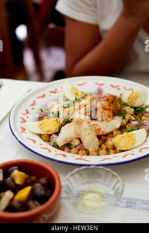 Portuguese Salada de bacalhau e grão-de-bico, (Salt Cod with Chickpeas and Egg) Stock Photo