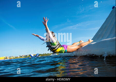 Girl diving into ocean, Seaside Heights, New Jersey, USA Stock Photo