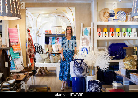 Portrait of mature female shop owner in her stylish boutique Stock Photo