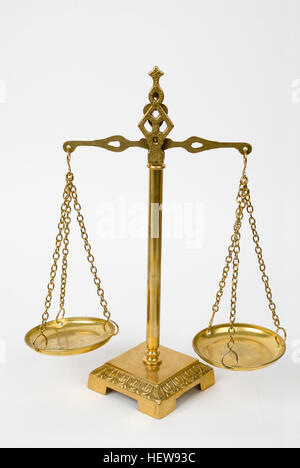 Brass scale, balance and weighing dishes Stock Photo