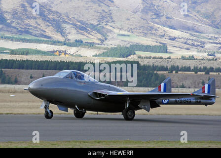 The de Havilland DH.100 Vampire was a British jet fighter developed and manufactured by de Havilland. Having been developed during the Second World War to harness the newly developed jet engine, the Vampire entered service with the Royal Air Force (RAF) in 1945. It was the second jet fighter, after the Gloster Meteor, operated by the RAF and its first to be powered by a single jet engine.  The RAF used the Vampire as a front line fighter until 1953 before it assumed secondary roles such as pilot training. It was retired by the RAF in 1966, replaced by the Hawker Hunter and Gloster Javelin. It  Stock Photo