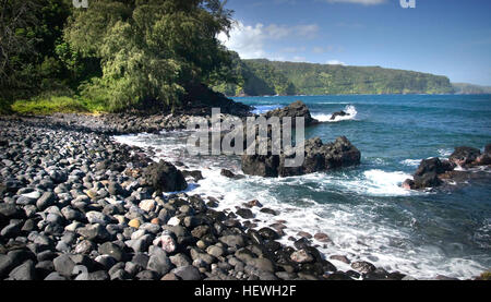 Keanae is an unincorporated town in Maui County on the island of Maui in the U.S. state of Hawaii. Ke‘anae is a peninsula known best for being one of Hawaii‘s major taro farm growing regions.One of the many scenes on the &quot;Road to Hana&quot; Stock Photo