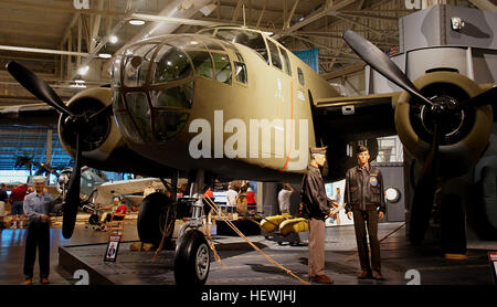 The B-25 medium bomber was one of America's most famous airplanes of World War II. It was the type used by Gen. Jimmy Doolittle for the Tokyo Raid on April 18, 1942.   Subsequently, B-25s saw duty in every combat area being flown by the Dutch, British, Chinese, Russians and Australians in addition to U.S. forces. Although the airplane was originally intended for level bombing from medium altitudes, it was used extensively in the Pacific Theater for bombing Japanese airfields and beach emplacements from treetop level, and for strafing and skip bombing enemy shipping.   Built by North American A Stock Photo