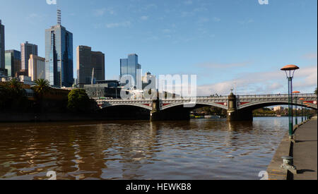 Princes Bridge, originally Prince's Bridge, is an important bridge in central Melbourne, Australia that spans the Yarra River. It is built on the site of one of the oldest river crossings in Australia. The bridge connects Swanston Street on the north bank of the Yarra River to St Kilda Road on the south bank, and carries road, tram and pedestrian traffic. The present bridge was built in 1888 and is listed on the Victorian Heritage Register.  Because of its position, Princes Bridge is often a focal point for celebratory events in Melbourne such as the Moomba Festival, New Years Eve and many cel Stock Photo