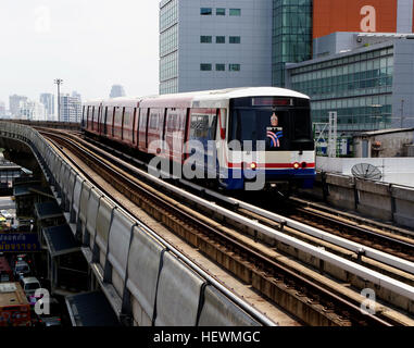 The Bangkok Mass Transit System, commonly known as the BTS Skytrain, is an elevated rapid transit system in Bangkok, Thailand. The Skytrain (BTS) and underground (MRT) rail systems connect the main shopping, entertainment and business areas of the city, while river taxis and express boats can be used to explore many historic sites and attractions at the riverside. Taxis are cheap and appear on virtually every corner at almost any time. Tuk-tuks, once a big Bangkok attraction, are slowly disappearing in favour of more comfortable transport, but are still worth a ride at least once. Stock Photo