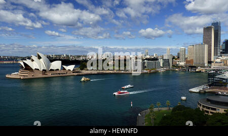 City in New South Wales, Australia Sydney, capital of New South Wales and one of Australia's largest cities, is best known for its harbourfront Opera House, with a distinctive sail-like design. Massive Darling Harbour and Circular Quay are hubs of waterside life, with the towering, arched Harbour Bridge and esteemed Royal Botanic Gardens nearby. Sydney Tower’s 268m glass viewing platform, the Skywalk, offers 360-degree views of the city, harbour and suburbs. Stock Photo