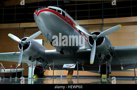 The Douglas DC-3 is a fixed-wing propeller-driven airliner. Its speed and range revolutionized air transport in the 1930s and 1940s. Wikipedia Wingspan: 29 m Weight: 7,650 kg Length: 20 m Manufacturer: Douglas Aircraft Company Designer: Arthur Emmons Raymond Engine types: Pratt &amp; Whitney R-1830 Twin Wasp, Wright R-1820 Stock Photo