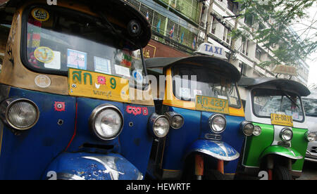 An auto rickshaw (in India), or rickshaw (in Pakistan) also known as a Bajay or Bajaj (in Jakarta, Indonesia), three-wheeler (in Sri Lanka), samosa, tempo, tuk-tuk (in Thailand), trishaw, autorick, bajaji (in Madagascar and Tanzania), keke Napep or Maruwa (in Nigeria), rick, tricycle (in the Philippines), mototaxi, baby taxi, lapa or tukxi (Piaggio Ape Calessino) in popular parlance, is a motorized development of the traditional pulled rickshaw or cycle rickshaw.  Most have three wheels and do not tilt. An exception is in Cambodia, where two different types of vehicles are called tuk-tuks, one Stock Photo