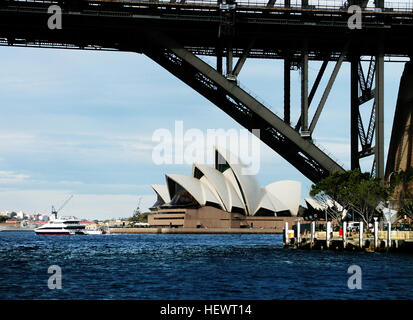 ication (,),,,Australia,Australian Ballet,Bennelong Point, Sydney,Expressionist architecture,Harbour cruise Sydney,Joan Sutherland Theatre,Louis Kahn,Mirror  Water,Opera Australia,Reflection,Steel Structure,Sydney Australia,Sydney Habour,Sydney Harbour Bridge,Sydney Harbour Ferries,Sydney Hop On Hop Off Bus,Sydney Opera House,Sydney Symphony Orchestra,Sydney Theatre Company,Sydney harbour,Sydney harbour cruises,Sydney sightseeing,Things to do in Sydney,White sails,Wonders of the World,architecture,bridge design,concert venue,modern architecture,performing arts,performing arts centre Stock Photo