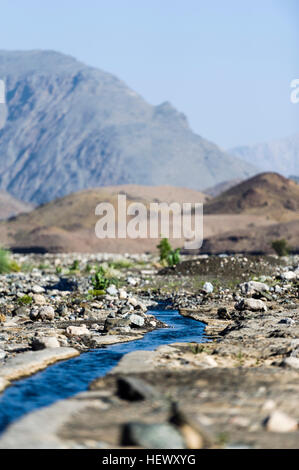 Traditional falaj irrigation system in the mountain village of Misfat ...